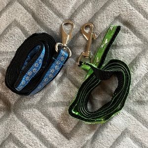 2 Pet leashes NWOT peanuts is 45” blue paw print is 58” long